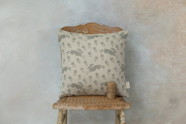 Running Hare Grey On White Linen Cushion