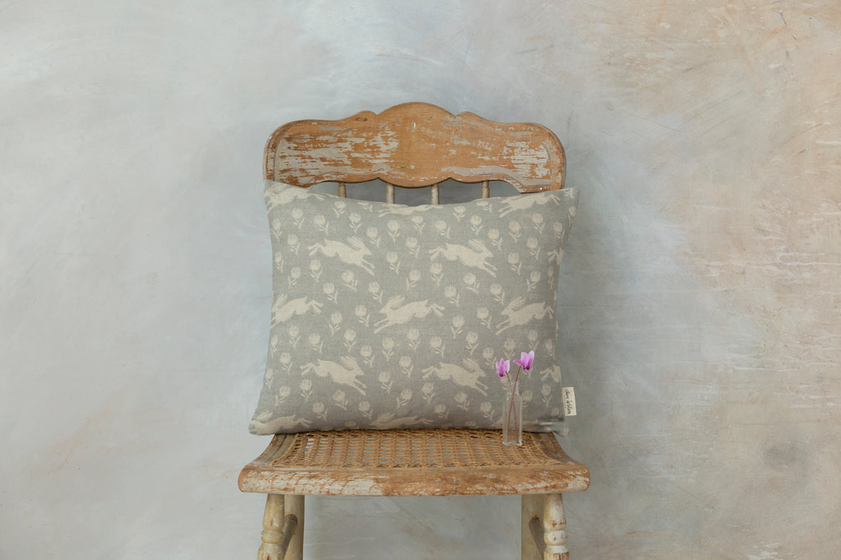 Running Hare White On Grey Rectangle Linen Cushion